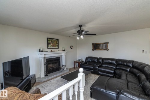 12 Elsinore Place, Edmonton, AB - Indoor Photo Showing Living Room With Fireplace