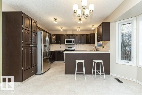 9717 85A Street, Fort Saskatchewan, AB - Indoor Photo Showing Kitchen With Upgraded Kitchen