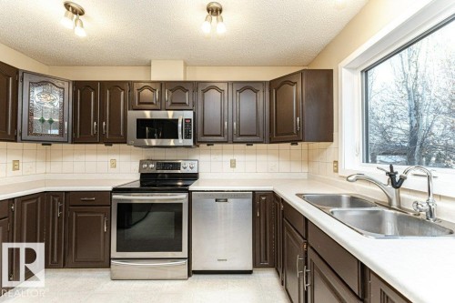 9717 85A Street, Fort Saskatchewan, AB - Indoor Photo Showing Kitchen With Double Sink