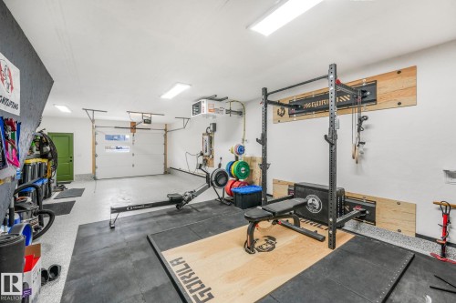 488 38A Street, Edmonton, AB - Indoor Photo Showing Gym Room