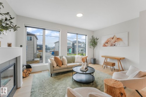 488 38A Street, Edmonton, AB - Indoor Photo Showing Living Room With Fireplace