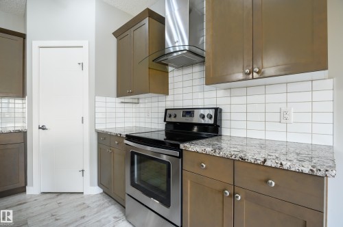 7298 Edgemont Way, Edmonton, AB - Indoor Photo Showing Kitchen With Upgraded Kitchen