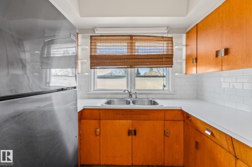 10818 38 Street, Edmonton, AB - Indoor Photo Showing Kitchen With Double Sink