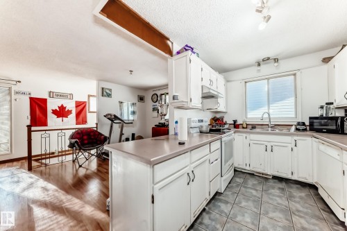 5144 37 Avenue, Edmonton, AB - Indoor Photo Showing Kitchen With Double Sink