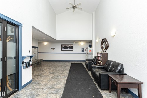 Common area with high vaulted ceiling - 108 2305 35A Avenue, Edmonton, AB - Indoor Photo Showing Other Room