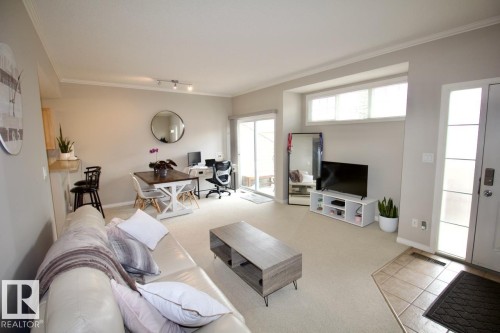 4 1179 Summerside Drive, Edmonton, AB - Indoor Photo Showing Living Room
