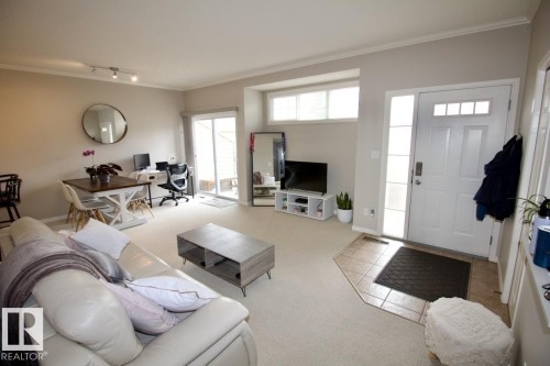 4 1179 Summerside Drive, Edmonton, AB - Indoor Photo Showing Living Room