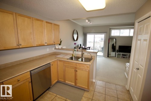 4 1179 Summerside Drive, Edmonton, AB - Indoor Photo Showing Kitchen With Double Sink
