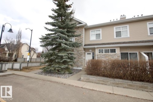 4 1179 Summerside Drive, Edmonton, AB - Outdoor With Facade