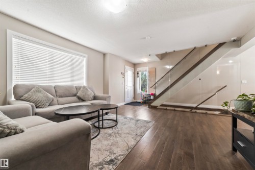 42 7289 South Terwillegar Drive, Edmonton, AB - Indoor Photo Showing Living Room