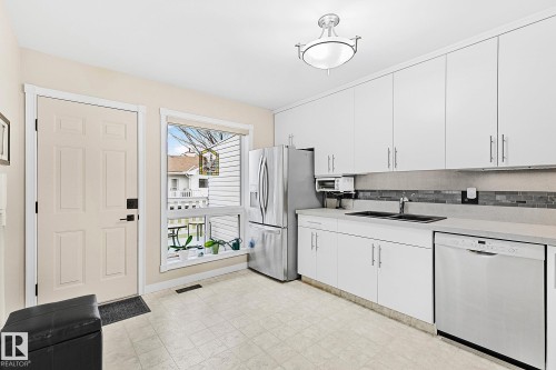 32 9704 165 Street, Edmonton, AB - Indoor Photo Showing Kitchen With Double Sink