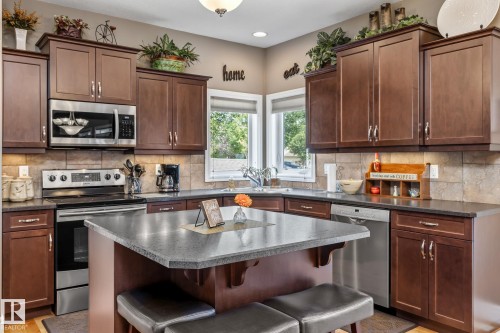 39 Hillside Terrace, Fort Saskatchewan, AB - Indoor Photo Showing Kitchen With Double Sink