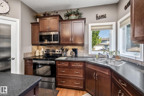 39 Hillside Terrace, Fort Saskatchewan, AB - Indoor Photo Showing Kitchen With Double Sink