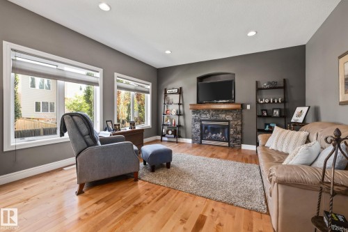 39 Hillside Terrace, Fort Saskatchewan, AB - Indoor Photo Showing Living Room With Fireplace