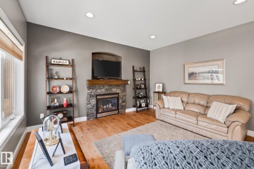 39 Hillside Terrace, Fort Saskatchewan, AB - Indoor Photo Showing Living Room With Fireplace