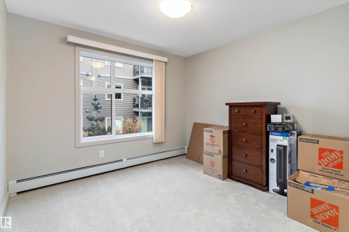 213 5510 Schonsee Drive, Edmonton, AB - Indoor Photo Showing Other Room