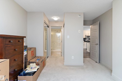 213 5510 Schonsee Drive, Edmonton, AB - Indoor Photo Showing Other Room