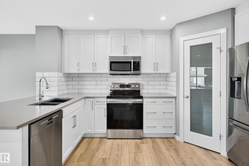244 Larch Crescent, Leduc, AB - Indoor Photo Showing Kitchen With Double Sink With Upgraded Kitchen