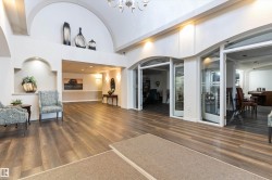 Community lobby featuring high vaulted ceiling - 