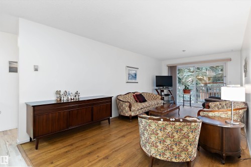 209 10915 21 Avenue, Edmonton, AB - Indoor Photo Showing Living Room