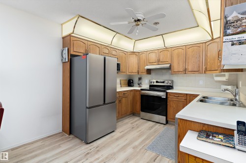 209 10915 21 Avenue, Edmonton, AB - Indoor Photo Showing Kitchen With Double Sink