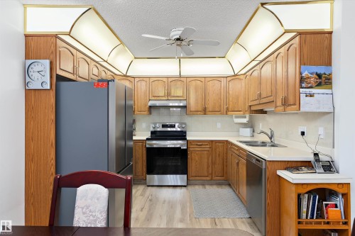 209 10915 21 Avenue, Edmonton, AB - Indoor Photo Showing Kitchen With Double Sink
