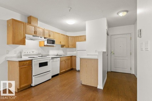 104 2741 55 Street, Edmonton, AB - Indoor Photo Showing Kitchen With Double Sink