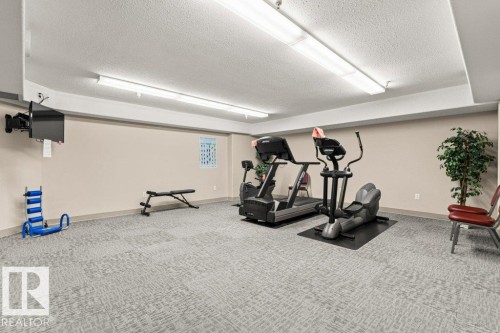 104 2741 55 Street, Edmonton, AB - Indoor Photo Showing Gym Room