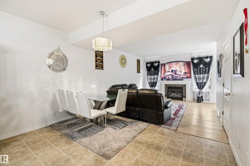 24 45 Ironstone, Red Deer, AB - Indoor With Fireplace