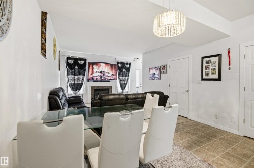 24 45 Ironstone, Red Deer, AB - Indoor With Fireplace