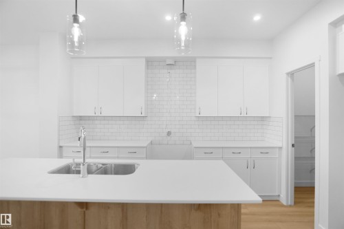 7235 182 Avenue, Edmonton, AB - Indoor Photo Showing Kitchen With Double Sink With Upgraded Kitchen