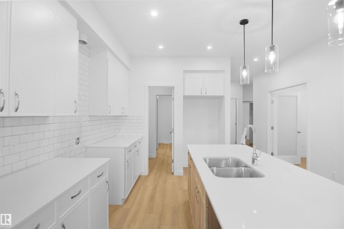 7235 182 Avenue, Edmonton, AB - Indoor Photo Showing Kitchen With Double Sink With Upgraded Kitchen