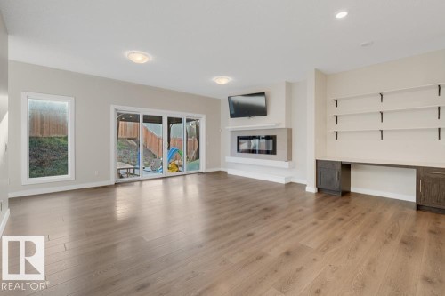 4250 Chichak Close, Edmonton, AB - Indoor Photo Showing Living Room With Fireplace