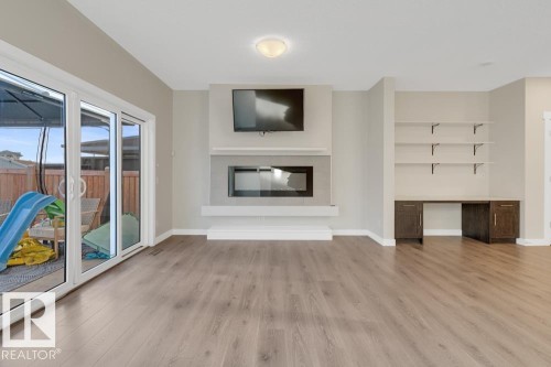 4250 Chichak Close, Edmonton, AB - Indoor Photo Showing Living Room With Fireplace