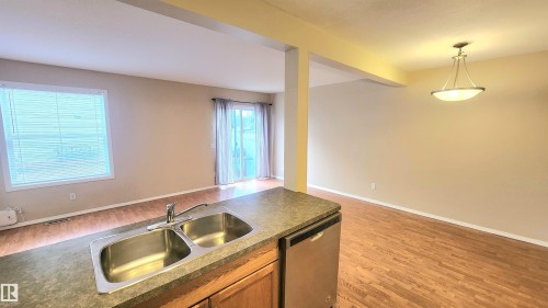 181 230 Edwards Drive, Edmonton, AB - Indoor Photo Showing Kitchen With Double Sink