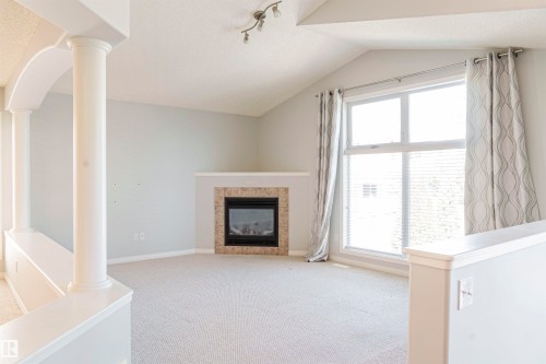 536 Leger Way, Edmonton, AB - Indoor Photo Showing Living Room With Fireplace