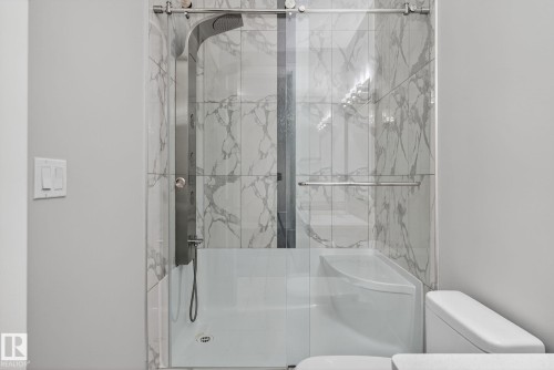 Bathroom with a marble finish shower - 8536 19 Avenue, Edmonton, AB - Indoor Photo Showing Bathroom