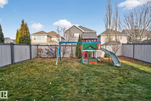 Fenced backyard with a playground - 8536 19 Avenue, Edmonton, AB - Outdoor