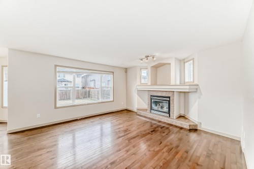 5930 165 Avenue, Edmonton, AB - Indoor Photo Showing Living Room With Fireplace