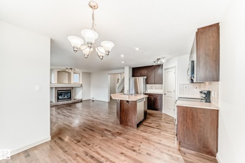 5930 165 Avenue, Edmonton, AB - Indoor Photo Showing Other Room With Fireplace