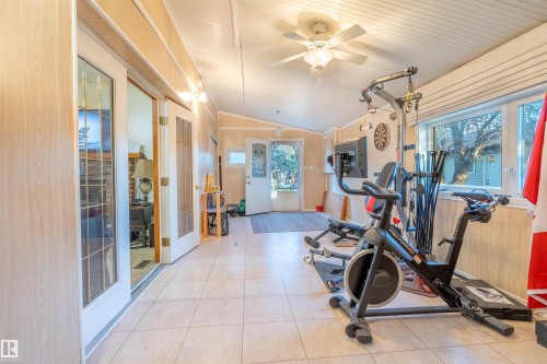 62 Buskmose Drive, Rural Wetaskiwin County, AB - Indoor Photo Showing Gym Room