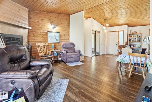 19 56420 Rge Road 231, Rural Sturgeon County, AB - Indoor Photo Showing Living Room With Fireplace
