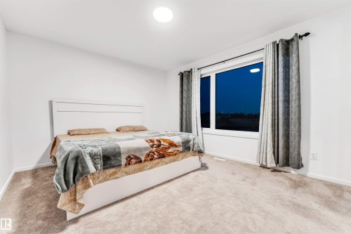 6205 46 Avenue, Beaumont, AB - Indoor Photo Showing Bedroom