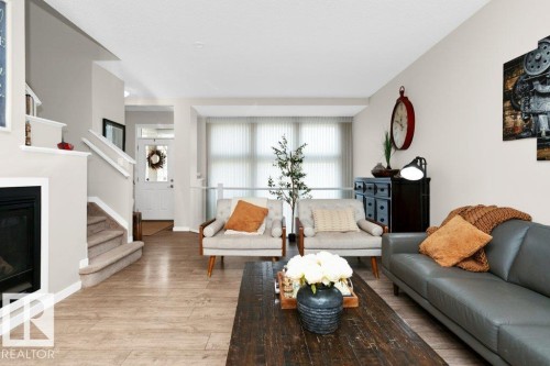 1527 Secord Road, Edmonton, AB - Indoor Photo Showing Living Room With Fireplace