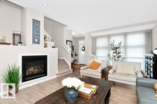 1527 Secord Road, Edmonton, AB - Indoor Photo Showing Living Room With Fireplace