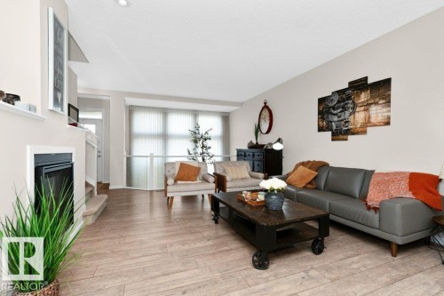 1527 Secord Road, Edmonton, AB - Indoor Photo Showing Living Room With Fireplace