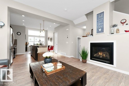 1527 Secord Road, Edmonton, AB - Indoor Photo Showing Living Room With Fireplace