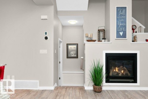 1527 Secord Road, Edmonton, AB - Indoor Photo Showing Living Room With Fireplace