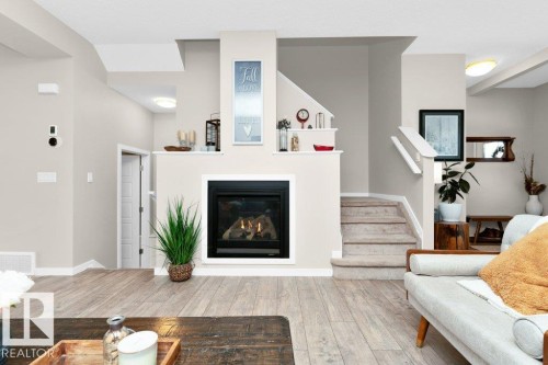 1527 Secord Road, Edmonton, AB - Indoor Photo Showing Living Room With Fireplace