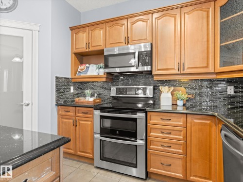 5116 Chateau Court, Beaumont, AB - Indoor Photo Showing Kitchen